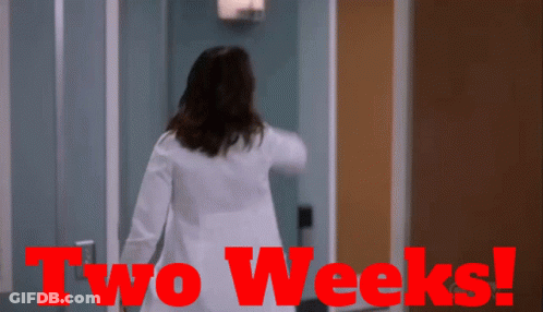 Woman In Lab Coat Walking Through Door Saying Two Weeks GIF