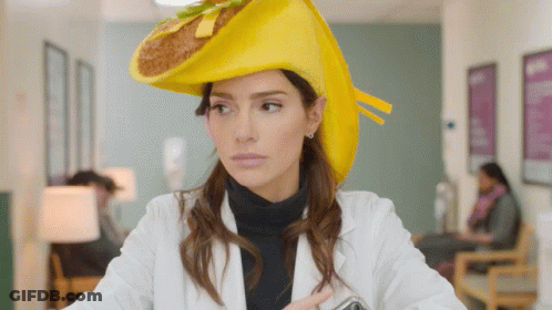 Woman In Lab Coat With Taco On Head GIF