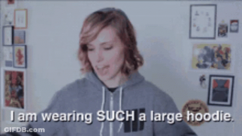 Woman In Large Hoodie Saying I Am Wearing Such A Large Hoodie GIF