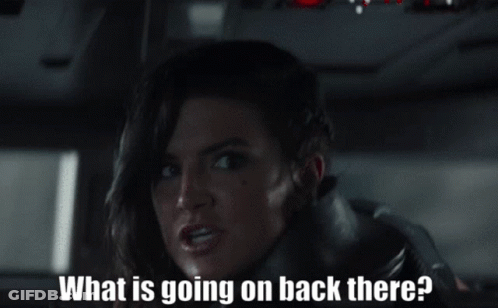Woman In Leather Jacket Asking What's Going On GIF