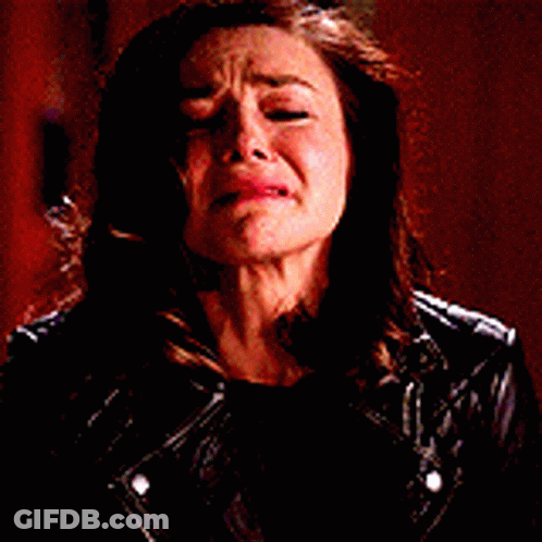 Woman In Leather Jacket Crying With Mouth Open GIF