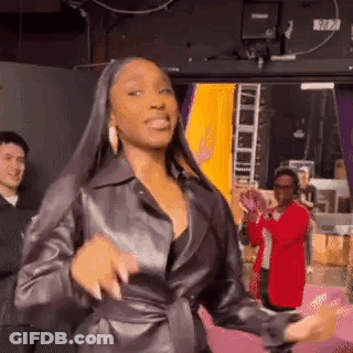 Woman In Leather Jacket Dancing GIF