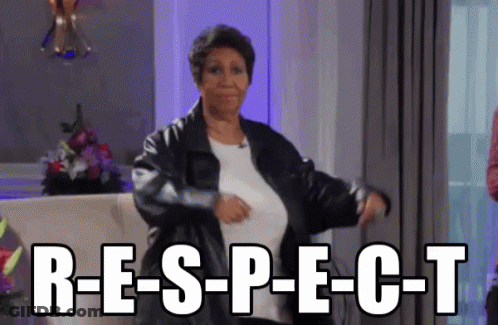 Woman In Leather Jacket Dancing Before Respect Sign GIF