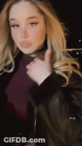 Woman In Leather Jacket Giving Thumbs Up GIF