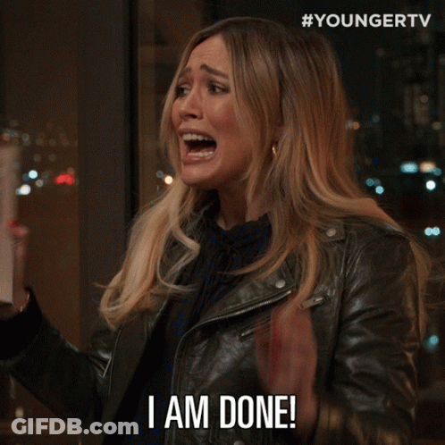Woman In Leather Jacket Holding Book Saying I Am Done GIF