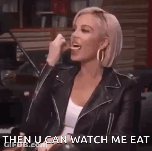 Woman In Leather Jacket Laughing Saying Then U Can Watch Me Eat GIF