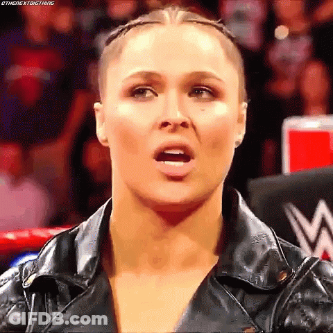 Woman In Leather Jacket Making Funny Face GIF