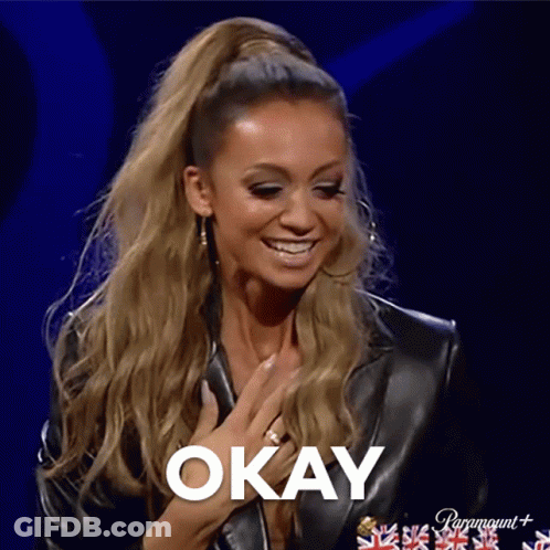 Woman In Leather Jacket Saying Okay GIF