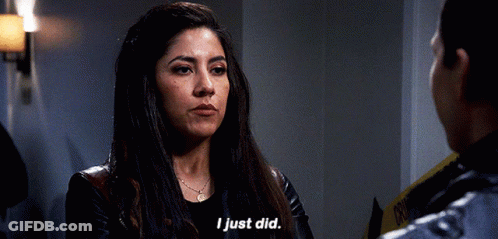 Woman In Leather Jacket Talking To Police Officer Says I Just Did GIF