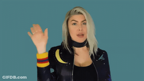 Woman In Leather Jacket Waving GIF