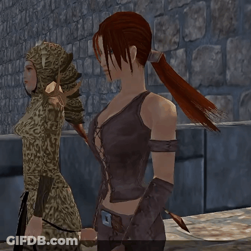 Woman In Leopard Print Dress Next To Another Woman GIF
