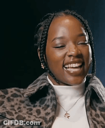 Woman In Leopard Print Jacket And Necklace GIF