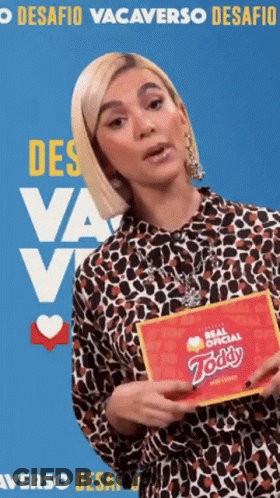 Woman In Leopard Print Shirt Holding Zoddy Card GIF
