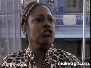 Woman In Leopard Print Shirt Making A Face GIF
