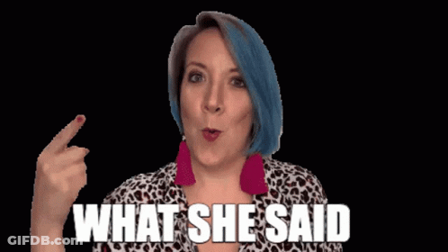 Woman In Leopard Print Shirt Pointing At GIF