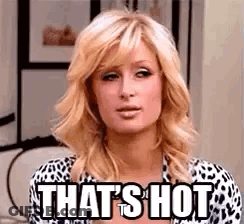 Woman In Leopard Print Shirt Saying That's Hot GIF
