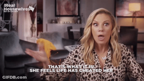 Woman In Leopard Print Shirt Says That GIF