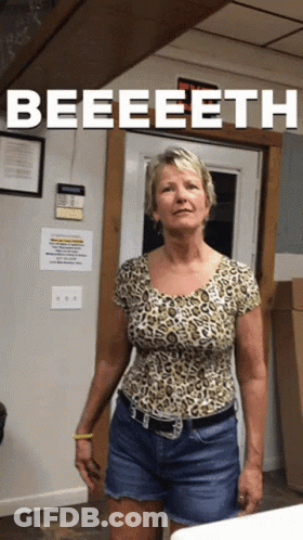 Woman In Leopard Print Shirt Shorts With Beeeeeth GIF