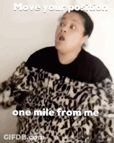 Woman In Leopard Print Sweater Says Move Your Position One Mile From Me GIF
