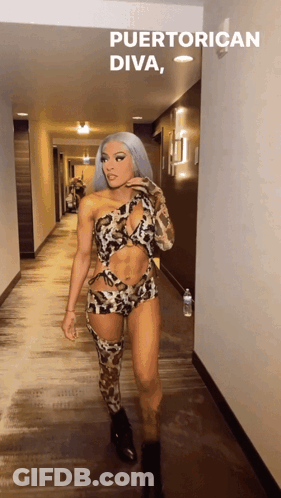 Woman In Leopard Print Walking Hallway Puerto Rican Diva GIF