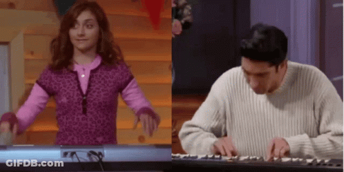 Woman In Leopard Sweater Next To Keyboard Player GIF