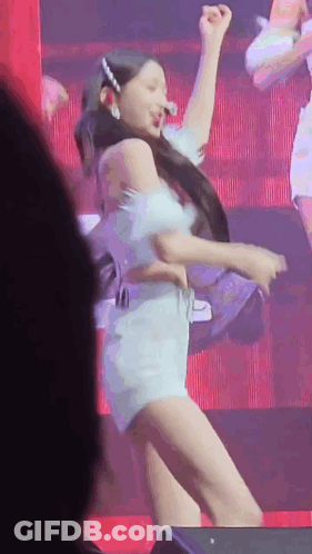 Woman In Light Blue Dress Dancing On Stage GIF