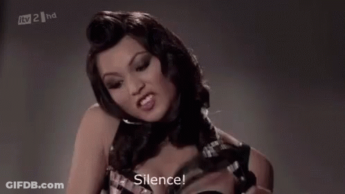 Woman In Lingerie Taking Off Bra GIF