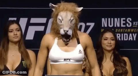 Woman In Lion Mask Standing GIF