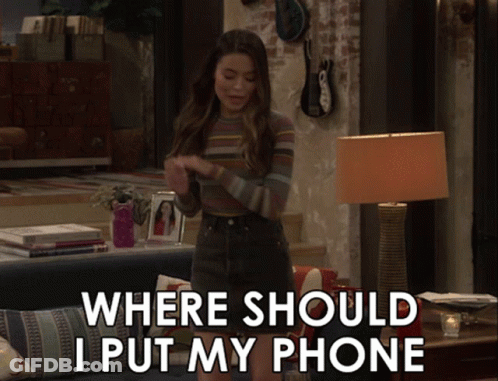 Woman In Living Room With Where Should I Put My Phone GIF