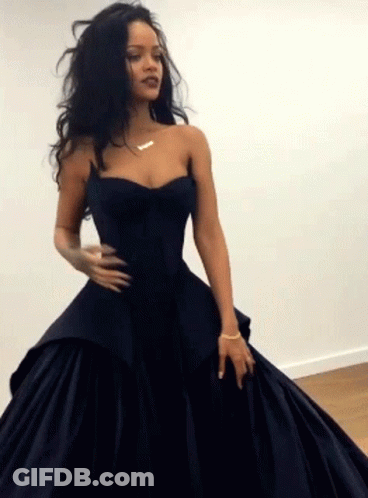 Woman In Long Black Dress With Gold Necklace GIF