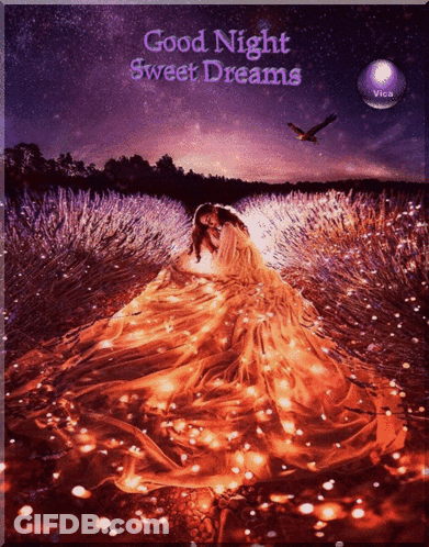Woman In Long Dress Surrounded By Lights Saying Good Night Sweet Dreams GIF