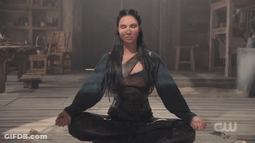 Woman In Lotus Position With CW GIF
