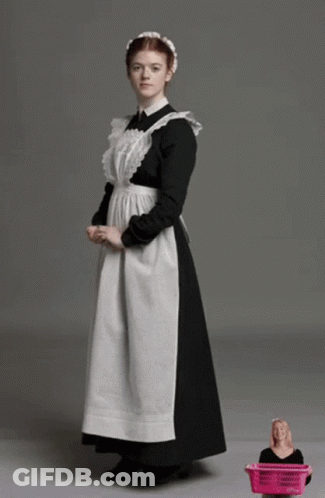 Woman In Maid Outfit Next To Pink Basket GIF