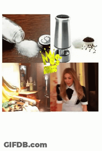 Woman In Maid Outfit Standing In Front Of Salt Shaker GIF
