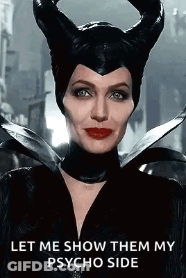 Woman In Maleficent Costume With Horns And Red Lips GIF