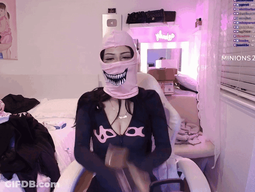 Woman In Mask And Minions 2 Shirt At Window GIF