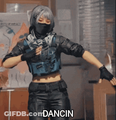 Woman In Mask Dancing With Dancin Text GIF