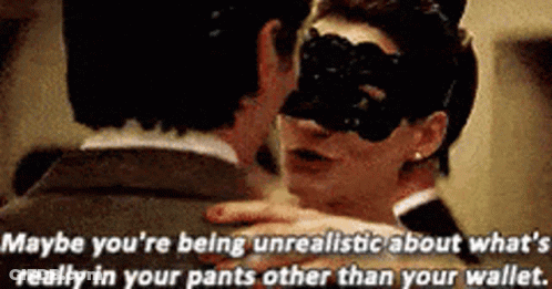 Woman In Mask Hugging Man In Suit GIF