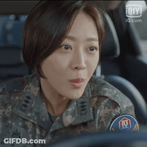 Woman In Military Uniform Sitting In Car GIF