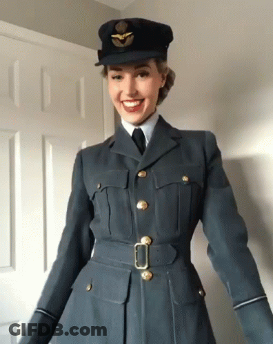 Woman In Military Uniform Smiling GIF