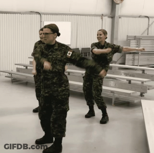 Woman In Military Uniform With Canadian Flag GIF