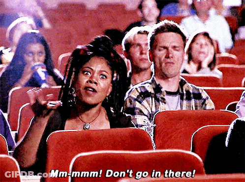 Woman In Movie Theater Saying Mm-Mmm Don't Go In There GIF