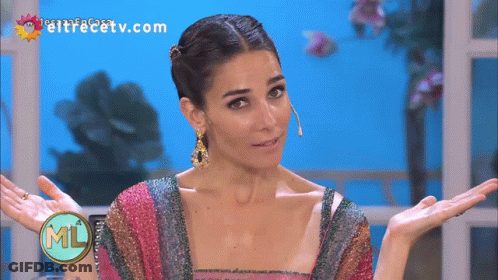 Woman In Multicolored Dress In Front Of Eltrecetv.com Screen GIF