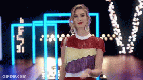 Woman In Multicolored Top With I Love You Lights GIF