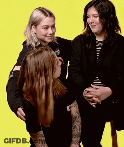 Woman In NASA Shirt Hugging Two Women GIF