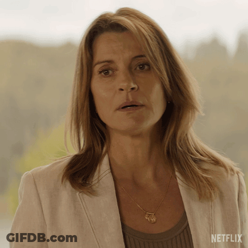 Woman In Necklace And White Jacket With Netflix GIF