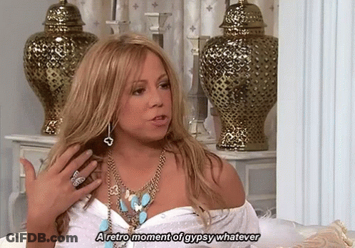 Woman In Necklace And White Shirt Talking About Retro Gypsy Moment GIF