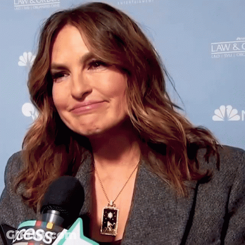 Woman In Necklace Talking Into Microphone Law & Order GIF