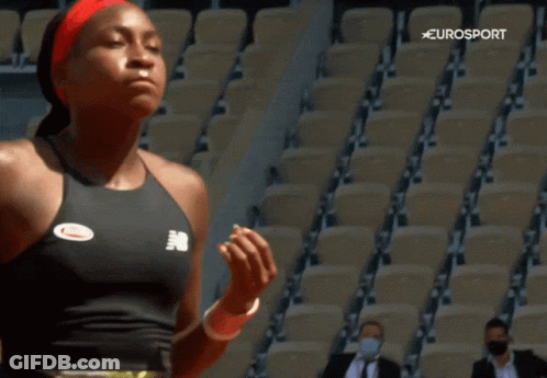 Woman In New Balance Tank Top Before Empty Seats GIF