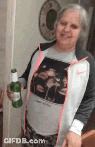 Woman In Nike Jacket Holding Beer Bottle GIF